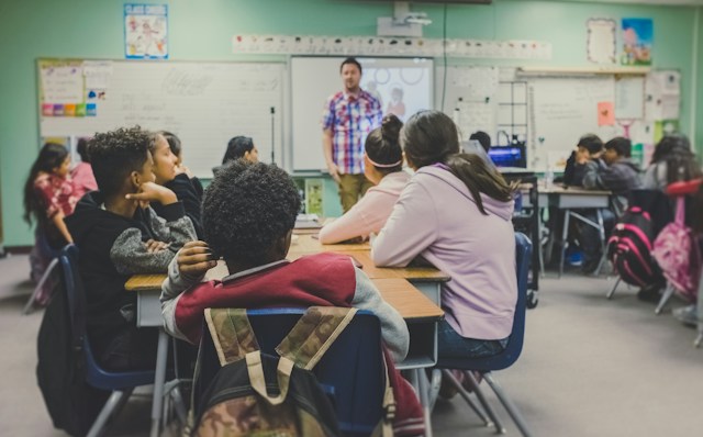 Teacher Standing in Class